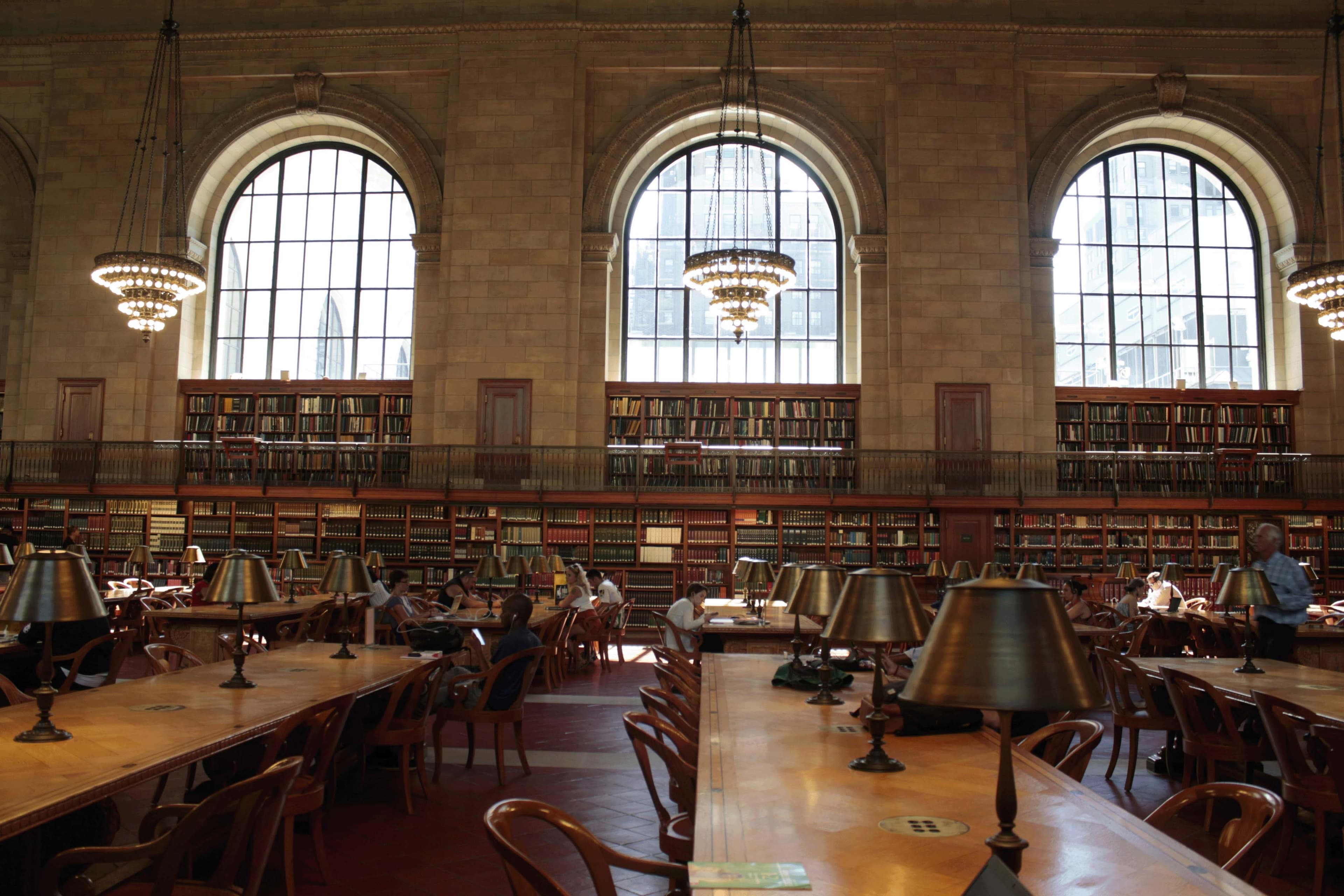 Individuals visiting the New York Public Library